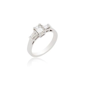Platinum Emerald cut diamond ring with tapered baguette shoulders