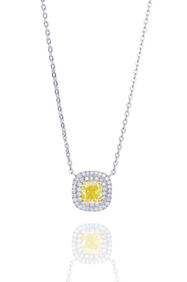 Platinum fanct vivid yellow diamond pendant.