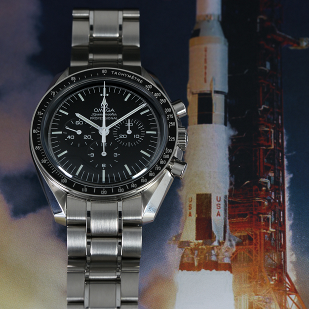 OMEGA-speedmaster-professional-watch-infront-of-space-rocket